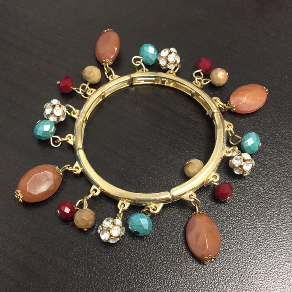 Stretch bracelet with multi colored charms
